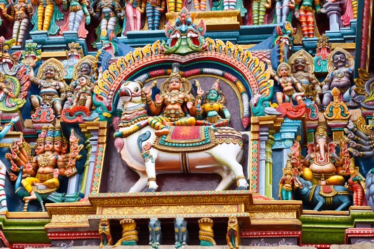 /img/2022/02/shiva-parvati-on-nandi-menakshi-temple-relief.jpeg